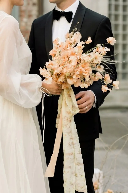 Gli sposi con il bouquet